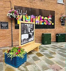 Signage and planters on Baillie Street